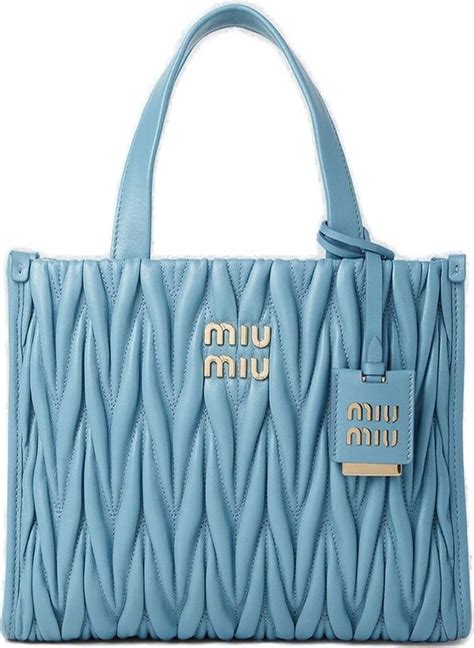 miu miu logo plaque top handle tote bag|Logo.